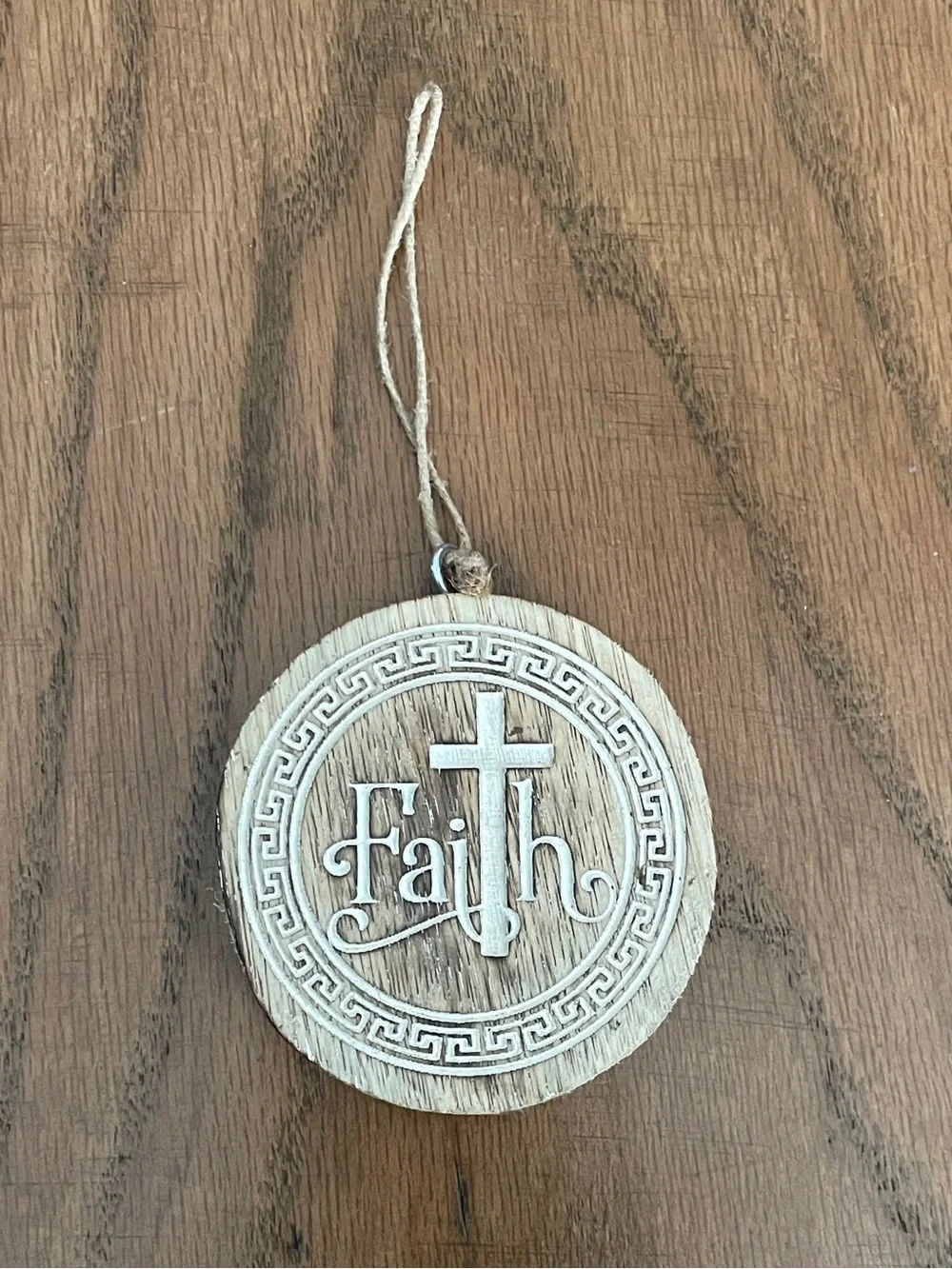 Wooden Christmas ornament or handing decor with the word 'Faith' cross design.